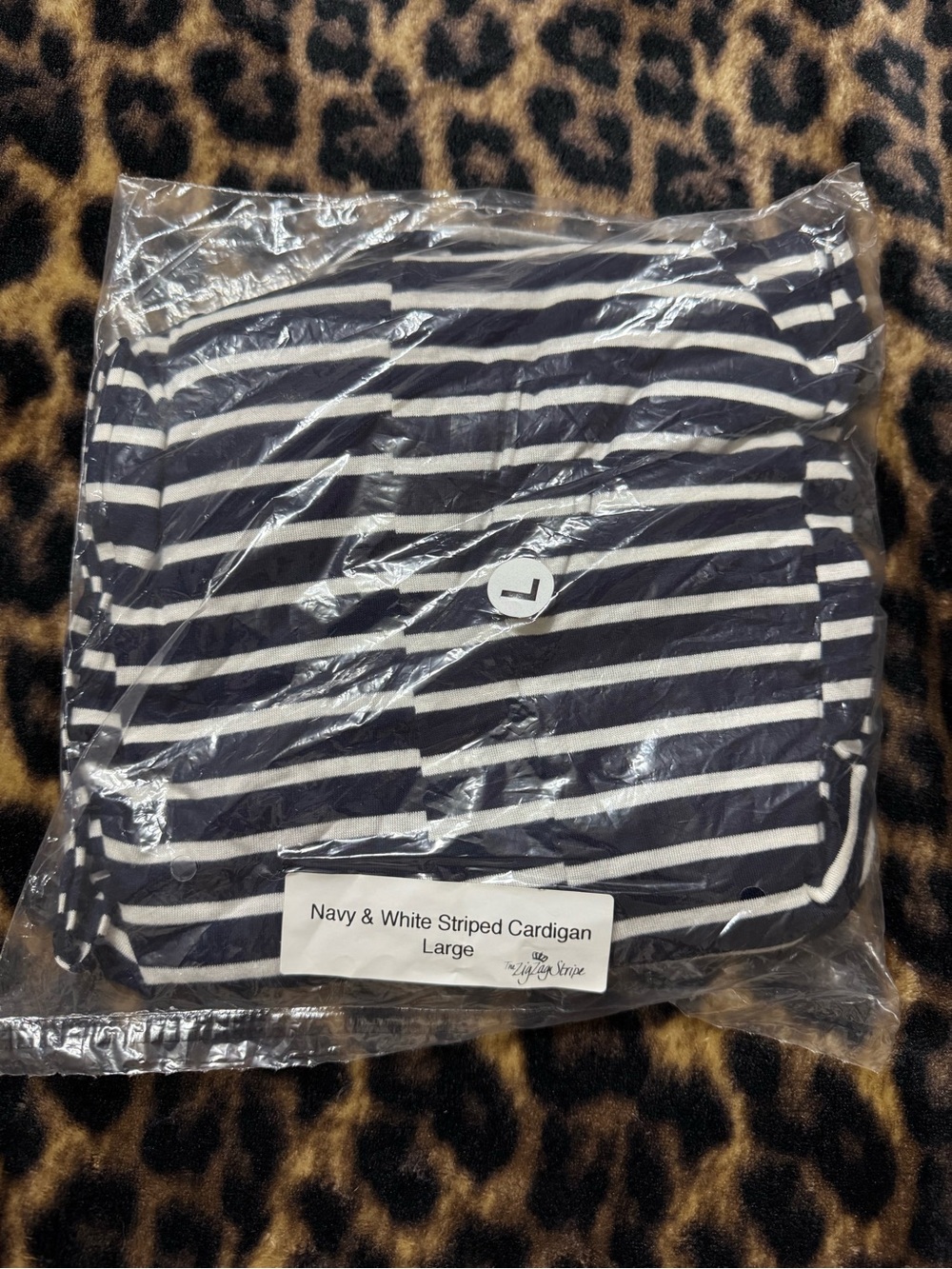 Navy and white striped knit cardigan